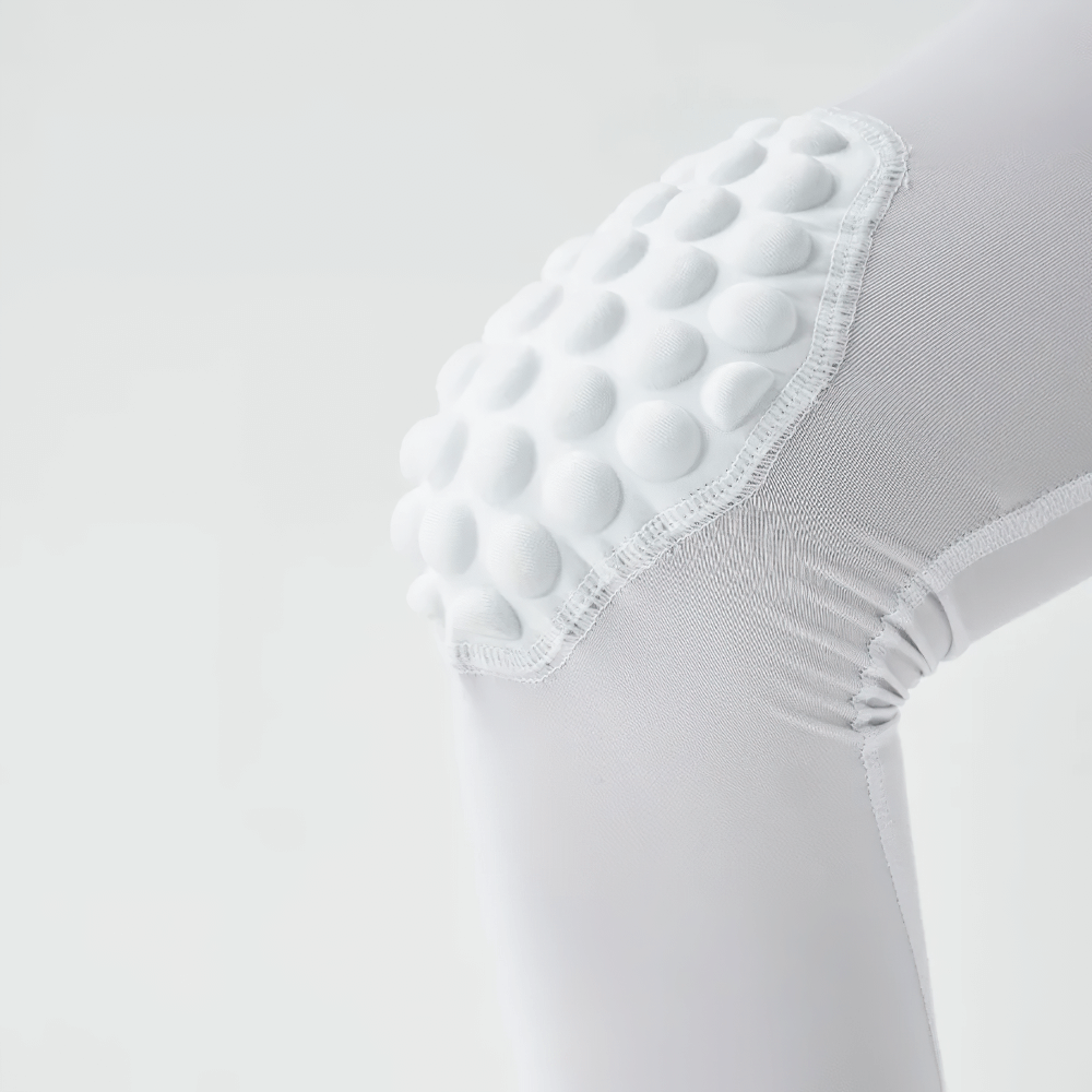 Close-up of knee padding on Sports Anti-collision Compression Leggings for Kids - SF3621, showing durable impact protection.